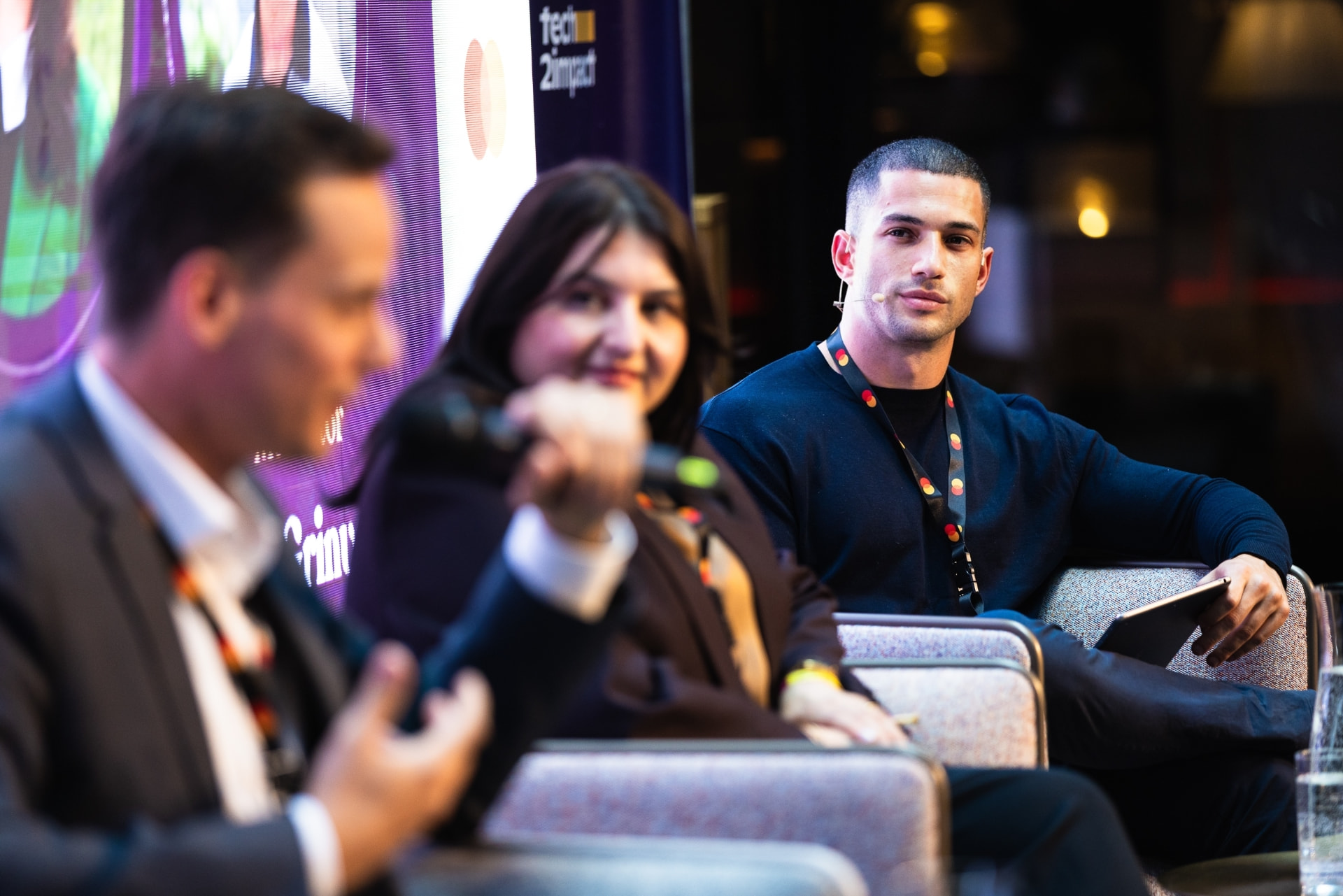 Amit Grinvald on a panel at a Tech2Impact conference