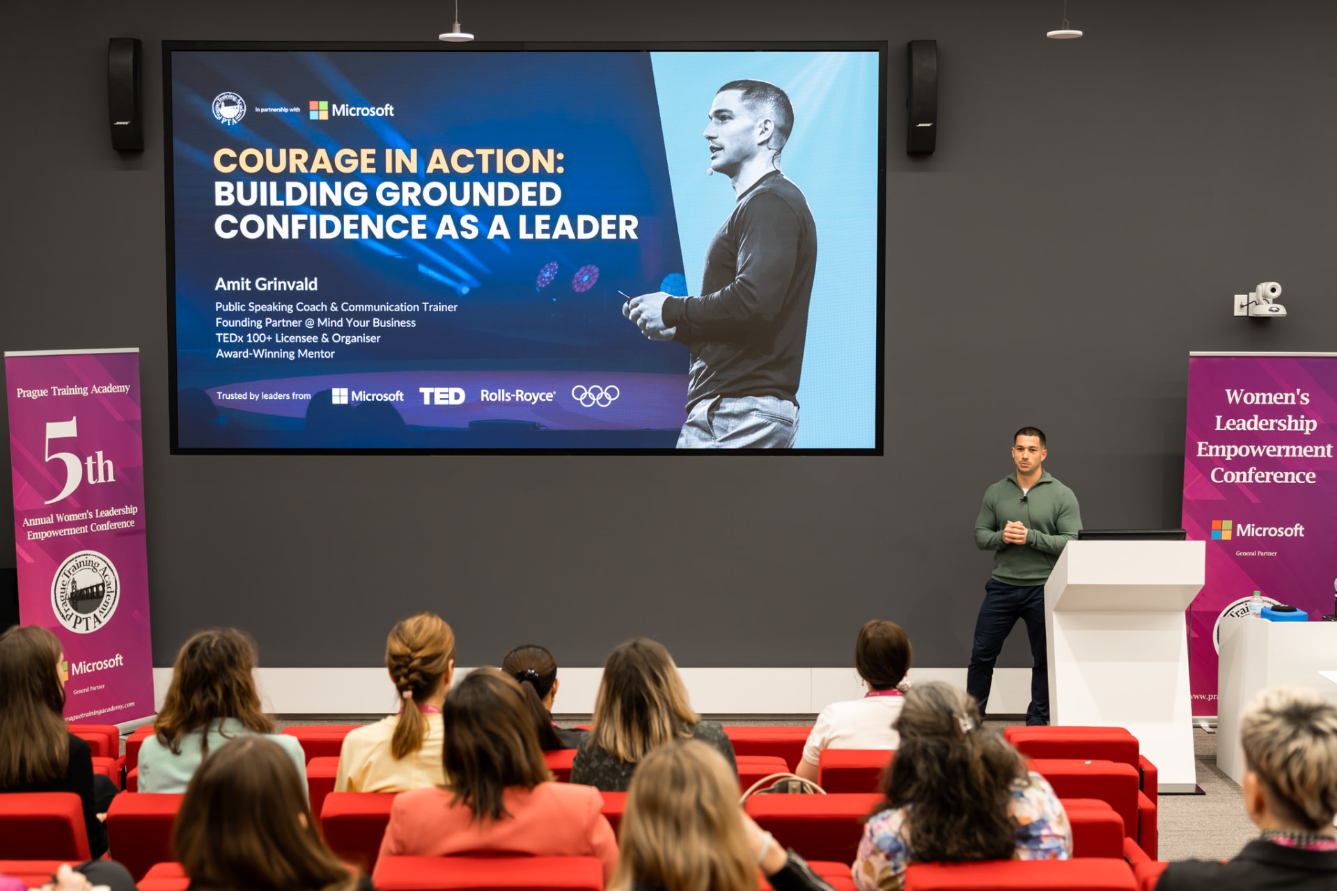 Amit Grinvald delivering a keynote at the Women's Leadership Empowerment Conference