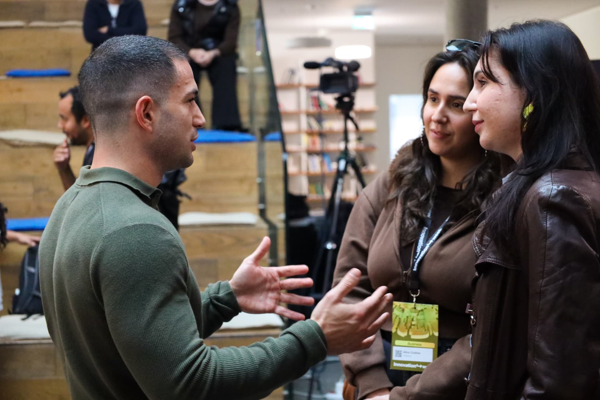 Amit Grinvald talking through a communication exercise with participants at an event